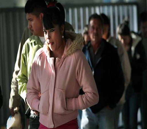 NOGALES, AZ - DECEMBER 10: Visitors stand in line to cross into the United States from Mexico at the border crossing on December 10, 2010 at Nogales, Arizona. Despite Arizona's tough immigration enforcement laws, thousands of Mexican citizens have permits to work in the U.S. and commute daily from their homes across the border in Mexico. Border crossings, known as "ports of entry," are run by the U.S. Office of Field Operations, which is part of the department of U.S. Customs and Border Protection. Port personnel are the face at the border for most visitors and cargo entering the United States and are authorized to stop, question, search and examine everyone entering the country. (Photo by John Moore/Getty Images)