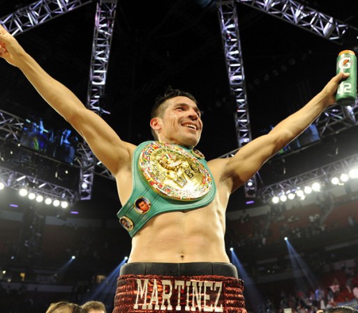 LAS VEGAS, NV - SEPTEMBER 15: Sergio Martinez celebrates after defeating Julio Cesar Chavez Jr. in twelve rounds by unanimous decision for their WBC middleweight title fight at the Thomas & Mack Center on September 15, 2012 in Las Vegas, Nevada. (Photo by Jeff Bottari/Getty Images)