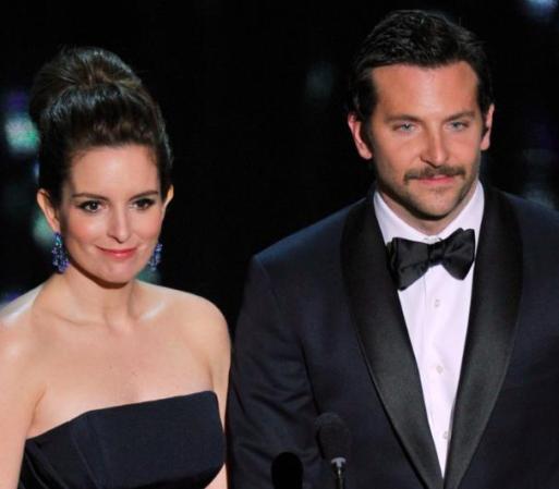 Tina Fey y Bradley Cooper fueron los encargados de anunciar a los nominados a Mejor Edición, la cual se llevó "La Chica del Dragón Tatuado".