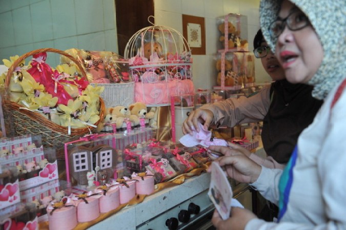 Cada año quienes lo celebran se gastan millones de dólares en chocolates y caramelos. (SURABAYA, Indonesia)
