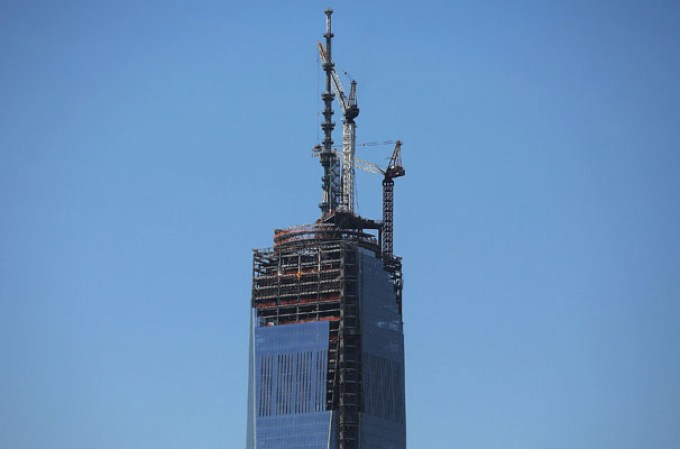 NEW YORK, NY - MAY 02: The 408-foot spire is seen after it was hoisted onto a temporary platform on the top of One World Trade Center on May 2, 2013 in New York City. When bolted into place at a later date, the spire will make One World Trade Center the tallest building in the Western Hemisphere.The raising of the spire, which comes on the second anniversary of the death of Osama bin Laden, will make One World Trade Center 1,776 feet tall. One World Trade Center is built on the site where the September 11, 2001 attacks toppled the original World Trade Center towers. (Photo by Spencer Platt/Getty Images)