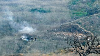 The site of a helicopter crash that claimed the lives of Kobe Bryant, his daughter, Gianna, the pilot, and 6 others, is shown Jan. 26, 2020, in Calabasas, California.