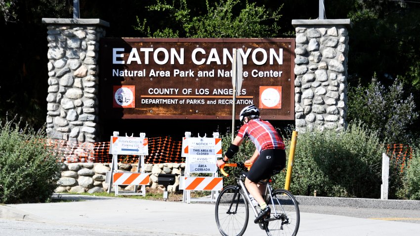 A cyclist rides past the closed Eaton Canyon Natural Area Park and nature Center that is closed due to the Coronavirus Pandemic in Altadena on on Tuesday, April 14, 2020. (Photo by Keith Birmingham/MediaNews Group/Pasadena Star-News via Getty Images)