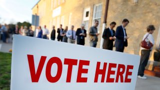 Voters line up to cast their ballots on Super Tuesday