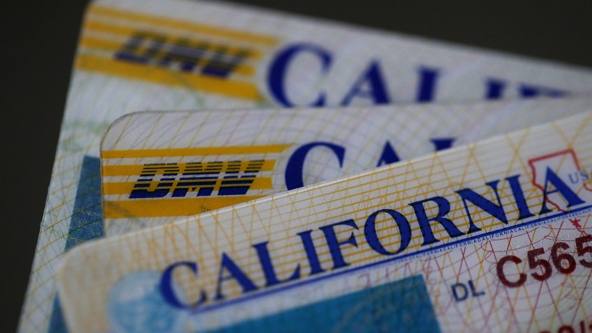 In this photo illustration, the California Department of Motor Vehicles (DMV) logo appears on a California driver license on May 9, 2017 in San Anselmo, California. The California Department of Motor Vehicles is being accused in a federal lawsuit of violating voter federal “motor voter” law with a requirement for over 1 million residents who renew their license by mail to fill out a seperate form with their renewal.  (Photo Illustration by Justin Sullivan/Getty Images)