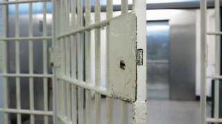 Stock photo of an open jail door