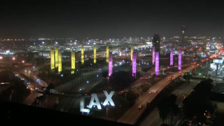 The Los Angeles International Airport light in up gold and purple on Jan. 27, 2020, in honor of Kobe Bryant. Bryant died on January 26th when the helicopter carrying him, his daughter Gianna and seven other people crashed, killing all onboard.