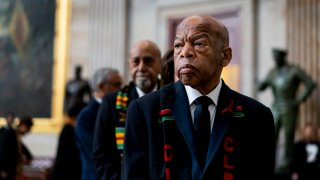 In this file photo, Civil Rights icon Congressman John Lewis (D-GA) prepares to pay his respects to U.S. Rep. Elijah Cummings (D-MD) who lies in state within Statuary Hall during a memorial ceremony on Capitol Hill on October 24, 2019 in Washington, DC.