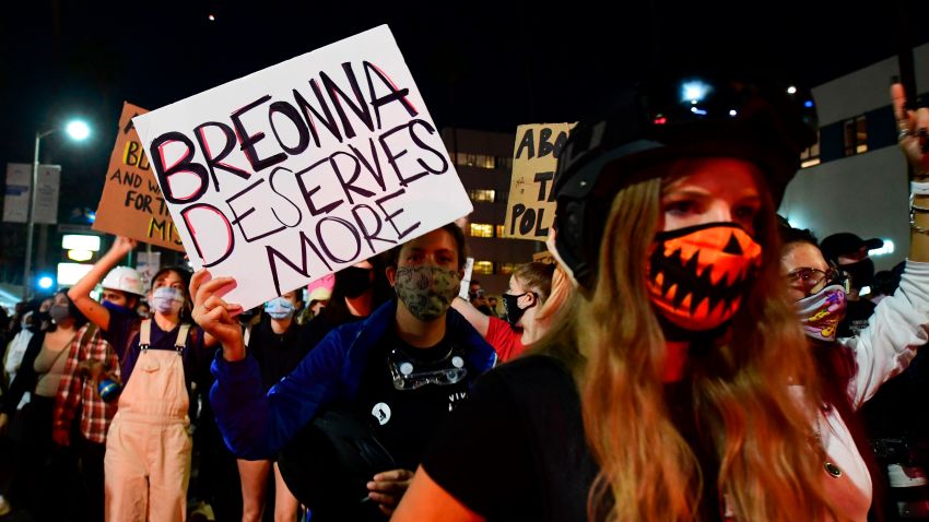 Demonstrators protesting the lack of criminal charges in the killing of Breonna Taylor by the Louisville Metropolitan Police Department, march along Sunset Boulevard in Hollywood, California on September 24, 2020 on the second night of protests.
