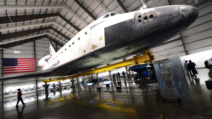 The Space Shuttle Endeavour is on display at the Samuel Oschin Pavilion at the California Science Center during a media preview ahead of the opening of Endeavour Fest, commemorating the one-year anniversary of the Endeavour’s arrival in Los Angeles, on October 11, 2013 in California. While visitors to the three-day exhibition will also see a SpaceX Dragon spacecraft as well as the west coast launch of the Red Bull Stratos Exhibit, the lack of funding to NASA due to the government shutdown precludes their participation in Endeavour Fest, as NASA will not be able to provide exhibits or displays for the event and the NASA scientist presentations will be cancelled  AFP PHOTO/Frederic J. BROWN        (Photo credit should read FREDERIC J. BROWN/AFP via Getty Images)