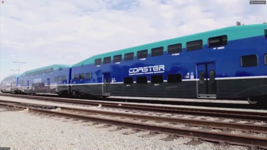 A North County Transit District Coaster runs along a train track in this undated image.