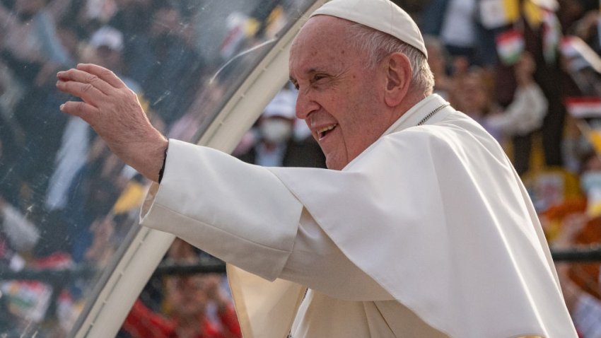 07 March 2021, Iraq, Erbil: Pope Francis waves from his popemobile to the cheering attendees as he arrives at Erbil’s Franso Hariri  Stadium to lead a mass as part of his visit to the autonomous Kurdistan Region in northern Iraq. Pope Francis arrived in Iraq on Friday for the first-ever papal visit to the Middle Eastern country, a place where the Christian community has dwindled amid years of war. Photo: STR/dpa (Photo by STR/picture alliance via Getty Images)