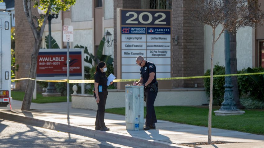 ORANGE, CA – APRIL 01: Officials work outside a business on Thursday, April 1, 2021 where four people were killed a day earlier, including one child, in a mass shooting at 202 W. Lincoln Ave., in Orange, CA. (Photo by Paul Bersebach/MediaNews Group/Orange County Register via Getty Images)