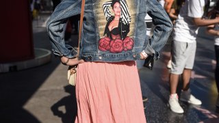 A Selena Quintanilla fan showing off the back of her jean jacket with Selena's image