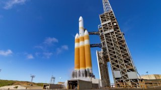 A Delta IV Heavy rocket sits on the launch pad April 26, 2021 at Vandenberg Air Force Base.