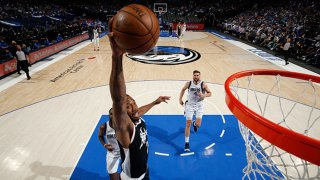 Kawhi Leonard #2 of the LA Clippers dunks the ball during the game against the Dallas Mavericks during Round 1, Game 3 of the 2021 NBA Playoffs on May 30, 2021 at the American Airlines Center in Dallas, Texas.