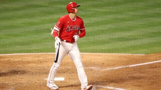 Shohei Ohtani #17 of the Los Angeles Angels watches his three run home run during the fourth inning against the Texas Rangers at Angel Stadium of Anaheim on May 25, 2021 in Anaheim, California.
