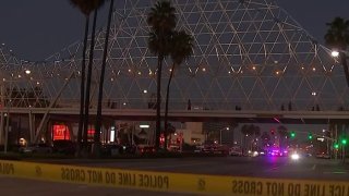 Crime scene tape at the scene of a shooting in downtown Long Beach.