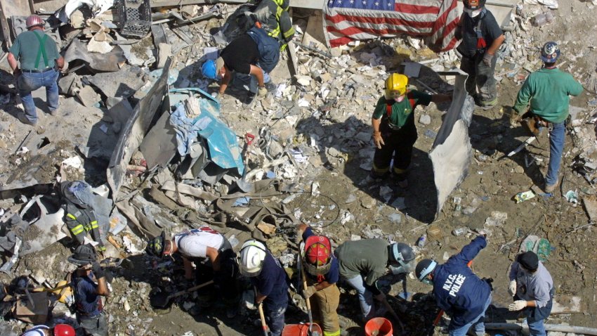 394392 16: Rescue workers dig in the wreckage of the World Trade Center September 13, 2001 in New York City, two days after two hijacked airplanes slammed into the twin towers, levelling them in an alleged terrorist attack. (Photo by Mario Tama/Getty Images)