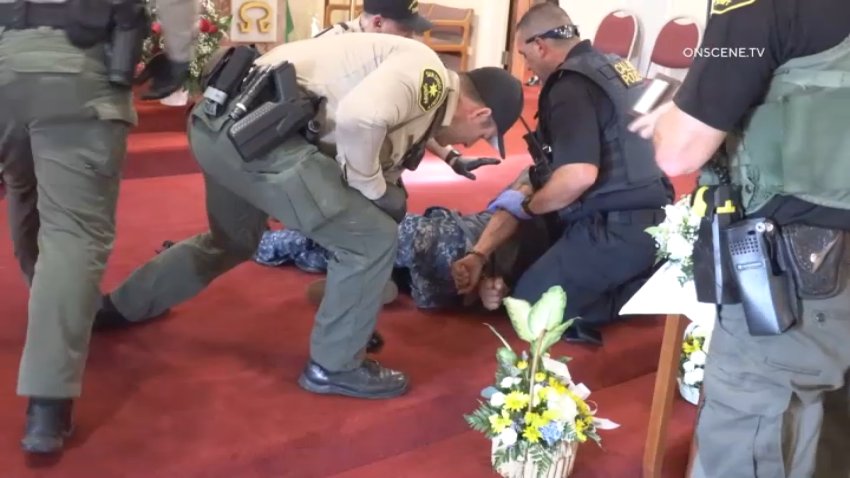 A felony suspect ran into the Most Prescious Blood Catholic Church during a service. He was taken into custody at the altar.