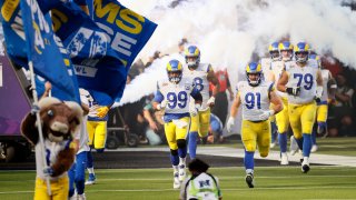 Los Angeles Rams players enter the field