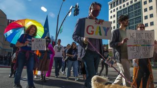 LGBTQ employees of Walt Disney Company protesting CEO Bob Chapek's handling of the staff controversy over Florida's "Don't Say Gay" bill.