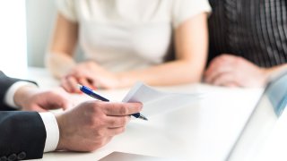 Couple having meeting with legal advisor