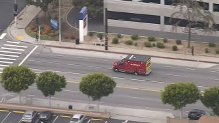 An ambulance arrives at a hospital following a police shooting March 31, 2022 in Inglewood.