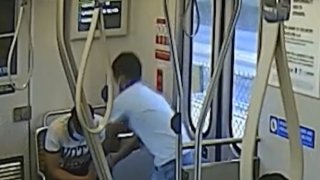 Man getting robbed on Metro train.