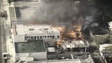 A building burns during the 1992 Los Angeles riots.