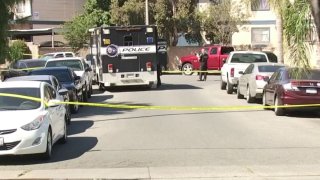 Police at the scene of a deadly shooting Thursday May 12, 2022 in Corona.