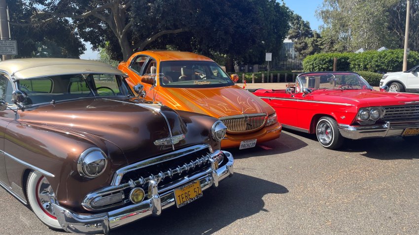 A group image of three lowriders in National City, as seen on Thursday, May 5, 2022.