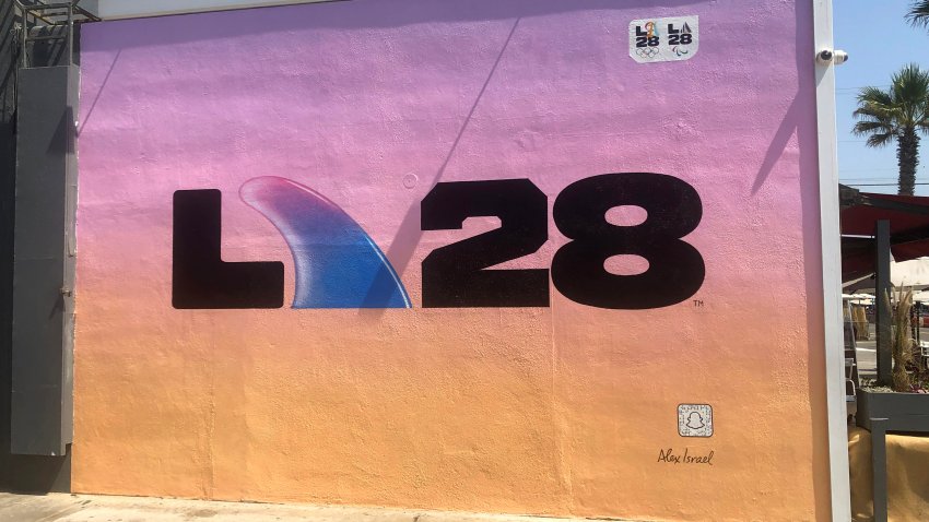 VENICE, CALIFORNIA – SEPTEMBER 02: A mural in Venice Beach with an LA28 logo designed by Multimedia artist Alex Israel on September 2, 2020. His ‘A’ design for LA28 represents a surfboard fin. The LA28 logo is for the Games of the XXXIV Olympiad hosted by Los Angeles in 2028. The 2028 Summer Olympics are scheduled to take place from July 21, 2028 to August 6, 2028. (Photo by Getty Images/Getty Images)