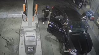 Security cameras captured video of an armed robbery at a gas station in the Fairfax Area of Los Angeles.