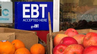 A sign noting the acceptance of electronic benefit transfer (EBT) cards.