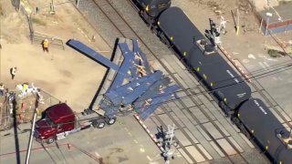 Scene of a collision between a cargo train and big-rig in Berkeley.