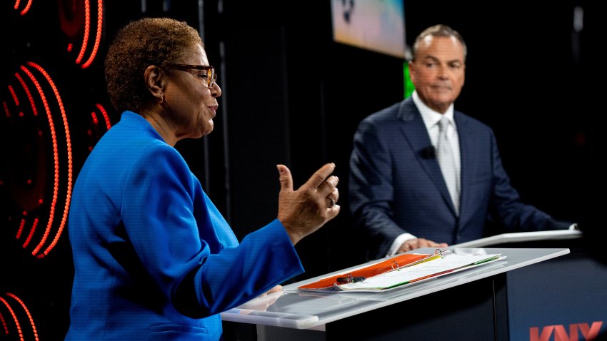 Rep. Karen Bass and Rick Caruso are pictured.