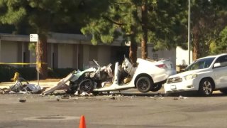 Firefighters used hydraulic tools to remove part of a car and rescued two occupants after a crash Wednesday Nov. 9, 2022.