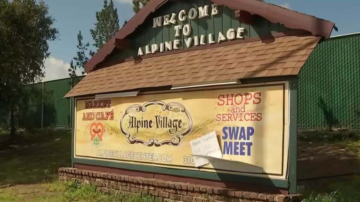 Dozens of vendors protest against the closure of the market in the Alpine village of Torrance