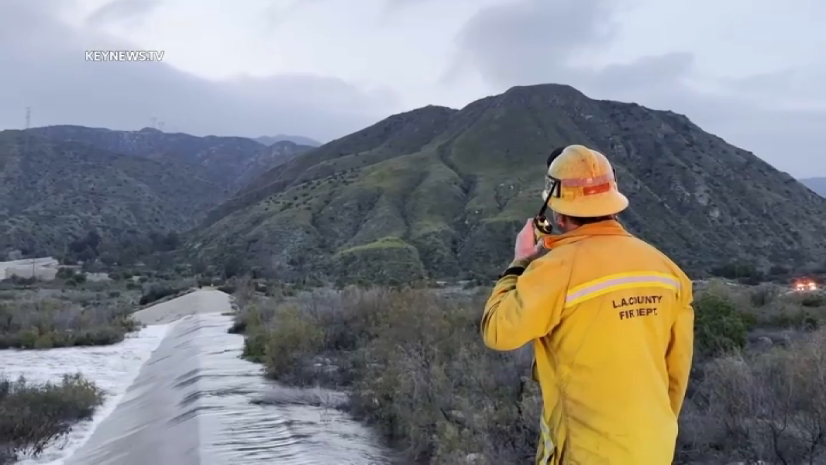 Eight people are rescued from the San Gabriel River but another is still missing
