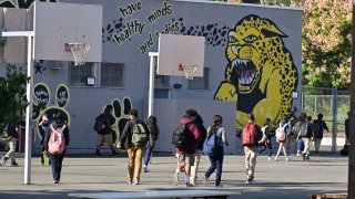 Students walk to their classrooms at a public middle school in Los Angeles.