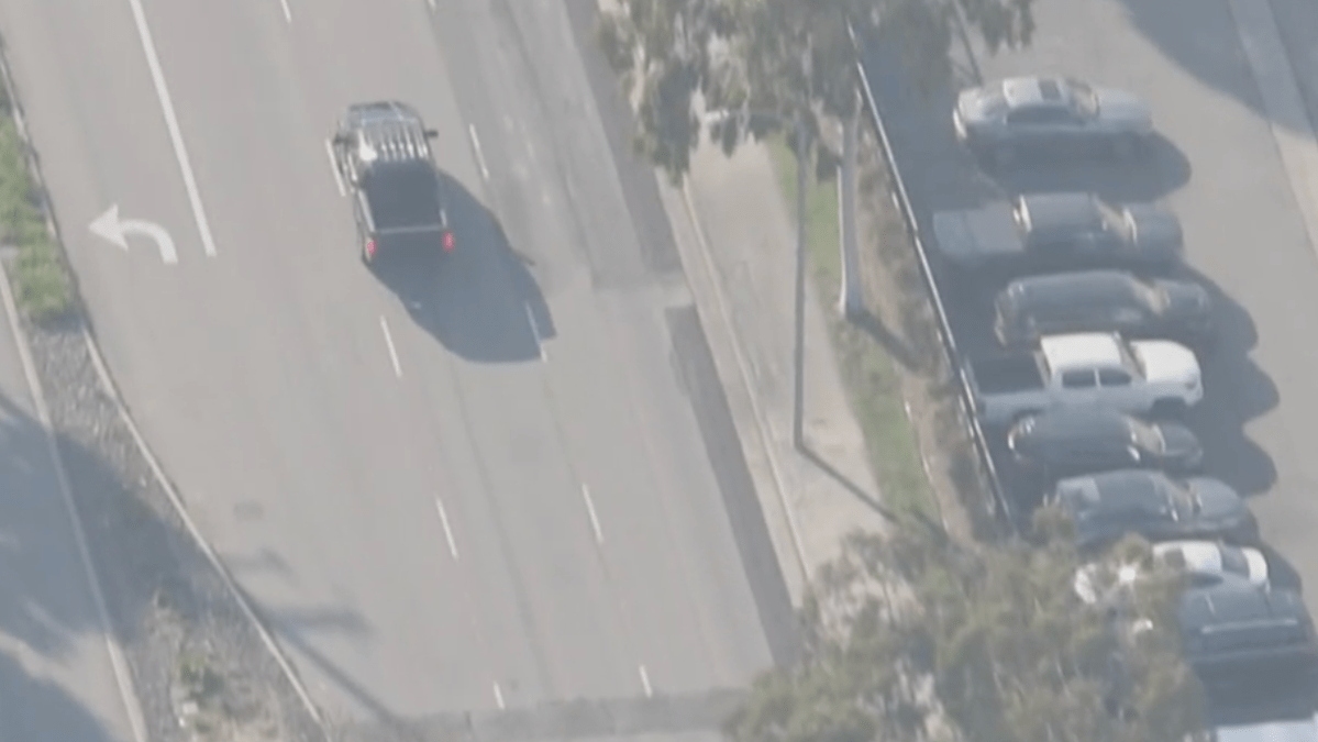 Officers chase suspected armed driver in Downey area