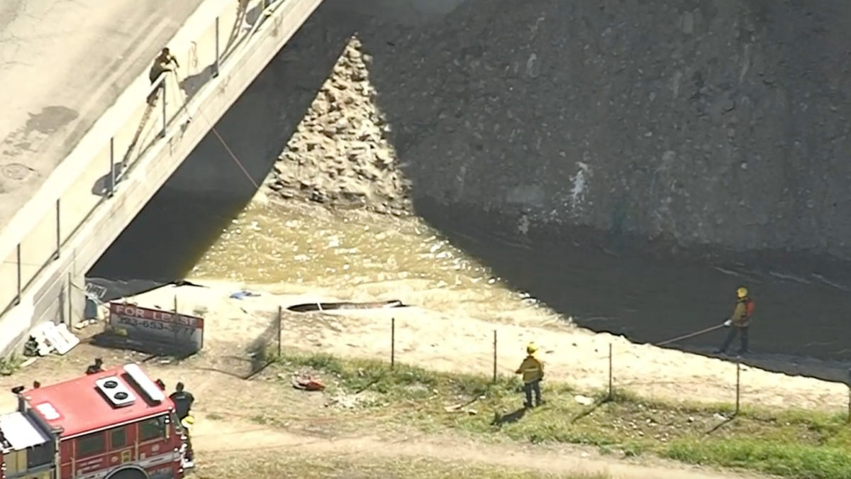 Firefighters respond to report of possible person trapped in the Pacoima Wash