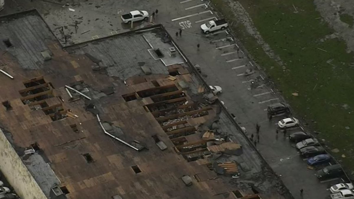The roof of the Montebello business damaged in a winter storm in Southern California