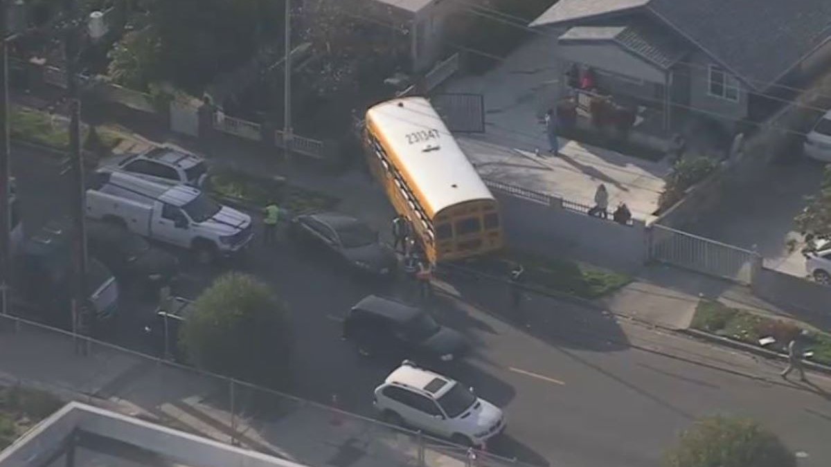 School bus crashes and ends up in South Los Angeles driveway