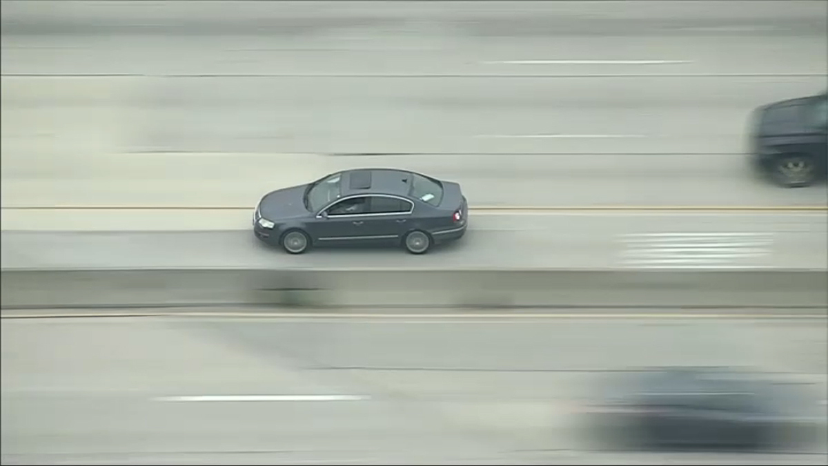 Multiple patrol cars chase the driver of a car in the San Fernando Valley