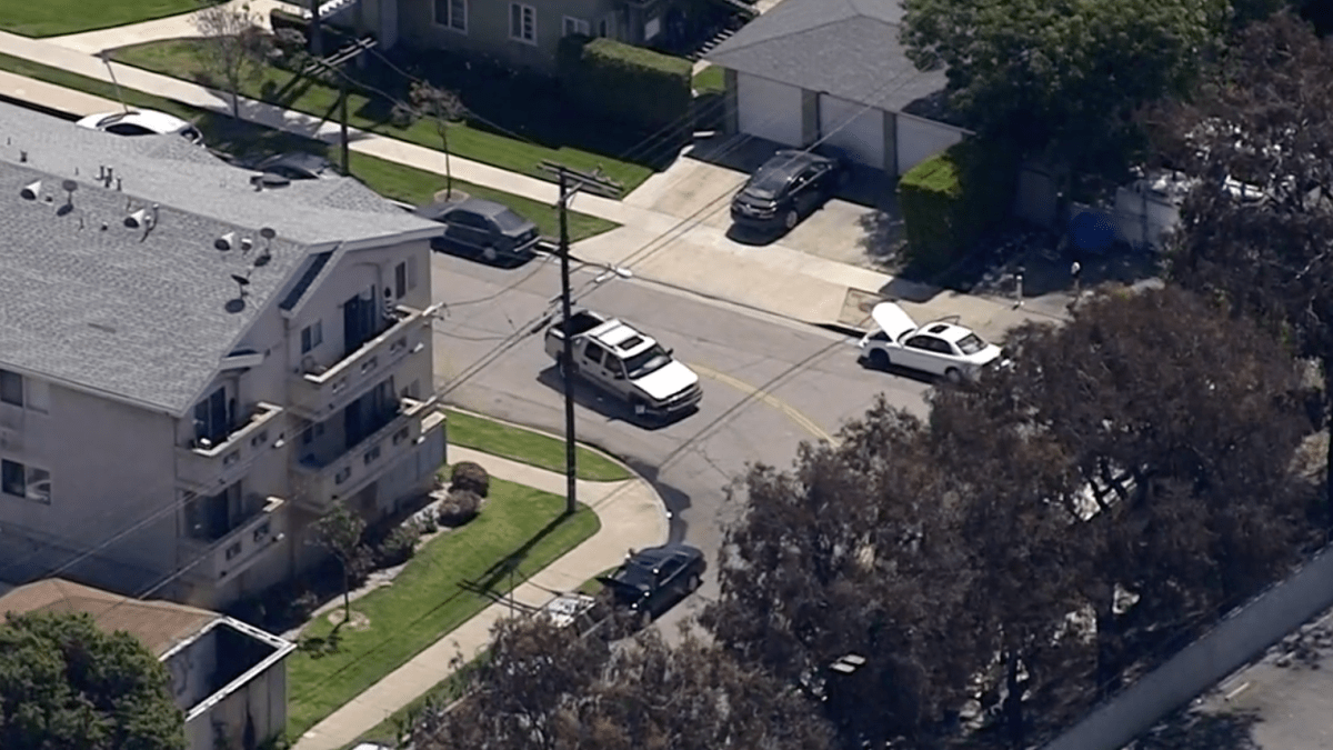 Police cars chase a murder suspect in the South Los Angeles area