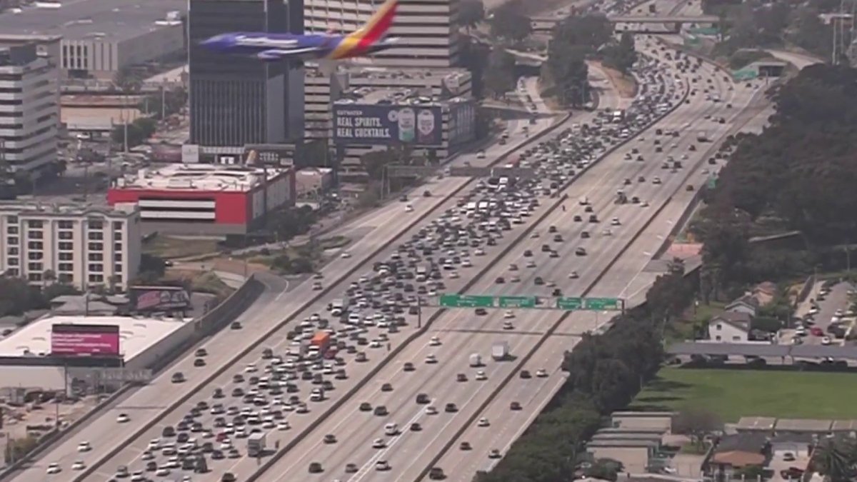 Police activity on the 405 freeway leads to the closure of several lanes near LAX airport