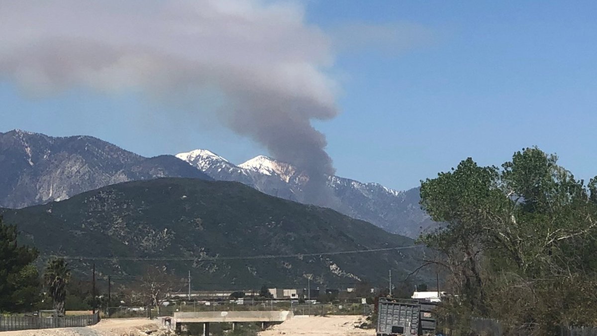 A wildfire burns in the mountains of San Bernardino County