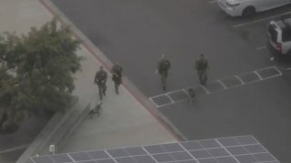 Orange County Sheriff's deputies and K9s are pictured at Aliso Niguel High School April 17, 2023.